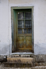 The old door of the country house. 
