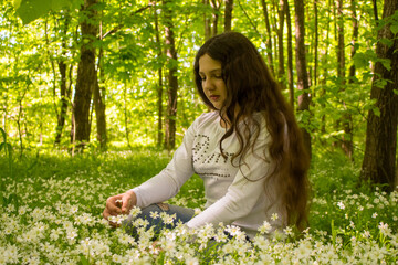 girl among white flowers..