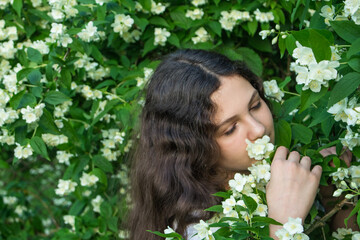 girl near jasmine flowers