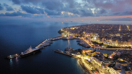 Aerial drone photo of iconic round port and Marina of Zea or Passalimani at dusk with beautiful colours, Piraeus, Attica, Greece