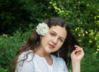 girl with a rose in her hair