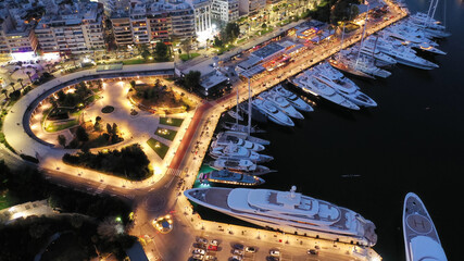 Aerial drone night shot of iconic illuminated marine museum in Marina of Zea, Piraeus, Attica,...