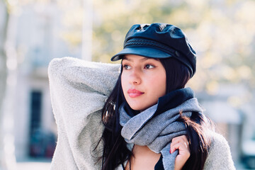 Attractive latin young woman on winter clothes