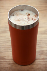Hot chocolate and hot coffee in a mug 