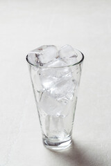 tall glass filled with ice