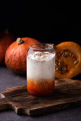 Healthy drink, pumpkin spice latte in a glass.