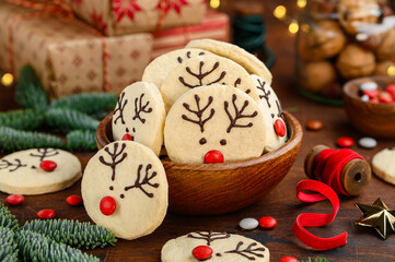 Christmas shortbread cookies deer rudolph. Festive New Year's dessert. Selective focus. 