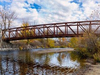 Greenbelt foot bridge on the Boise River in autumn