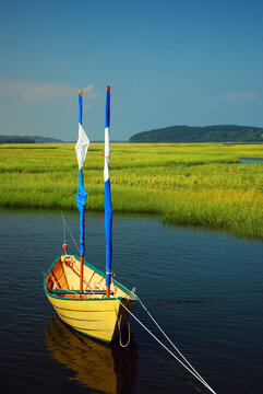 A Small Dinghy Floats In A Salt March