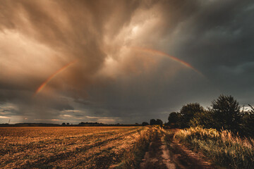 Obraz premium Rainbow on the field in Poland.