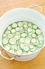 Cucumber water in white bowl