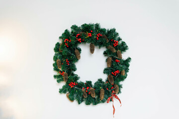 Christmas wreath on a white background with copying space