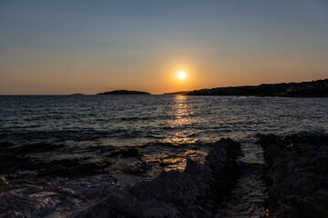 Wonderful summer sunset over Adriatic sea at the coast of Rogoznica, Croatia