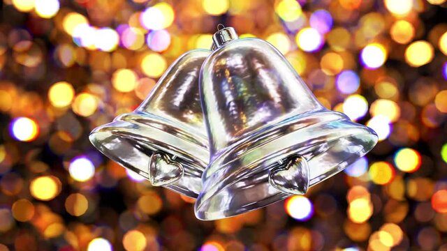 Realistic looping 3D animation of two cozy silver metallic Christmas bells with beautiful golden yellow bokeh rendered in UHD
