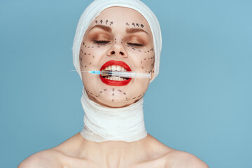 a person posing in blue gloves red lips surgery facial rejuvenation studio lifestyle