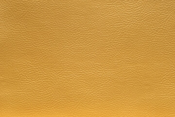 Leather texture in golden metallic color, background.