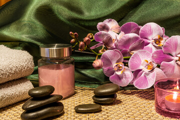 Spa, zen basalt stones, towels, candles in the massage room.
