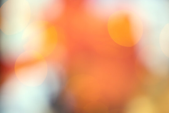 abstract yellow and orange bokeh lights background