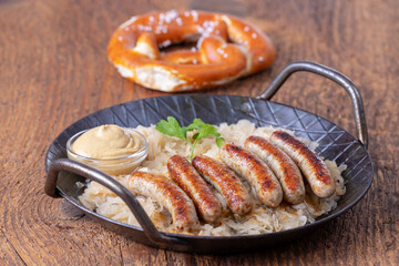 grilled nuremberger bratwurst with sauerkraut