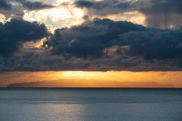 Fototapeta premium Golden sunrise with lots of clouds in Madeira