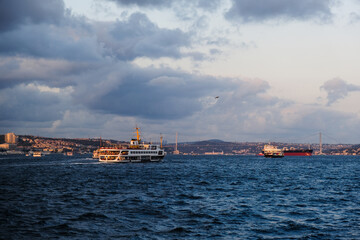 Fototapeta premium Ships in the ocean, view of the port, cloudy sky, ship sailing, sea, İstanbul, turkey, phosphorus 