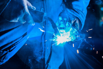 Close-up of welding and metal work in the hands of an industrial welder