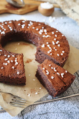 Fototapeta na wymiar Chocolate Zucchini Pie, cocoa powder and sugar dressing