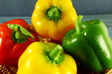 garden fresh yellow,red,green pepper or bell pepper in basket