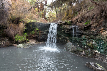 Waterfall on the Kerosene creek thermal river, rotorua, new zealand