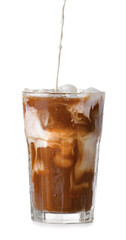 Pouring of milk into glass with tasty iced coffee on white background