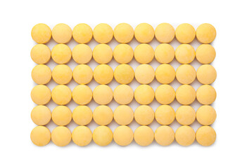 Vitamin A pills on white background