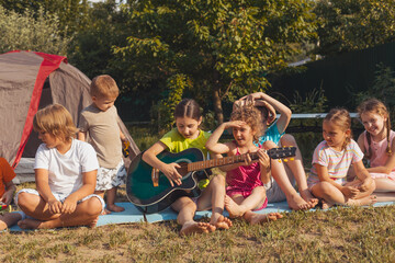 children's party in the backyard in the summer