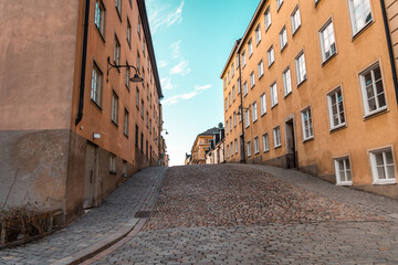 Fototapeta na wymiar Narrow city Street in Old Town of Stockholm, Gamla Stan, Sweden