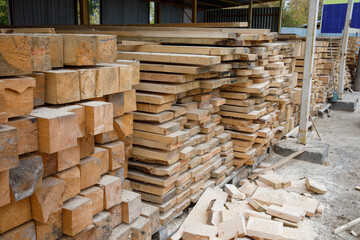 Sale of pine boards intended for construction. Warehouse wood bars boards.