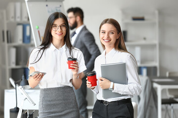 Fototapeta premium Business people having coffee break in office