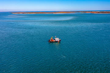 aerial image of a coast guard buoy tender