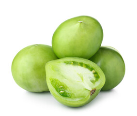 Cut fresh green tomatoes on white background