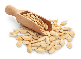 Scoop with natural pumpkin seeds on white background