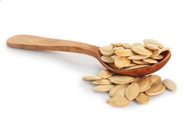 Spoon with natural pumpkin seeds on white background