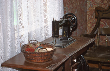 A Vintage Sewing Machine on a Traditional Sewing Table