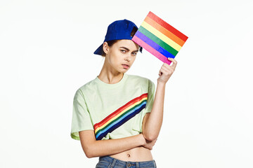 woman wearing white t-shirt lgbt flag inventor community