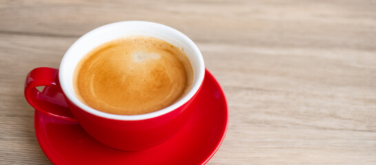 Hot espresso coffee on table, Red coffee cup in cafe or home.Top view with blank copy space for your text.