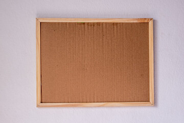 brown wooden board whiteboard frame on white wall background