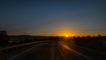 Fototapeta na wymiar Road to the sunrise in Solano County 
