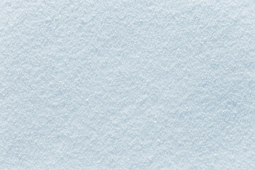Natural snow texture, white blue snowy background, frozen surface