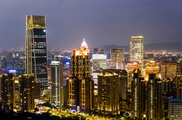 Fototapeta premium Night view of Taipei Xinyi District from the top of the Xiangshan mountain in Taipei Taiwan. 