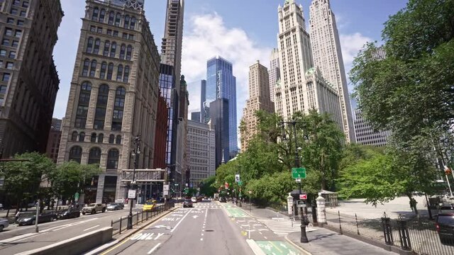 Low angle aerial drone view of Manhattan skyscraper buildings in New York City. NYC is financial, economic and business center of America.