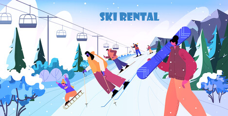 people skiing snowboarding men women doing winter activities christmas new year holidays celebration ski rental