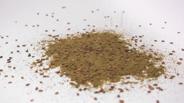 Za'atar Falling On Surface. Zaatar Herb With Spice Mixture Of Toasted Sesame Seeds And Dried Sumac. close up