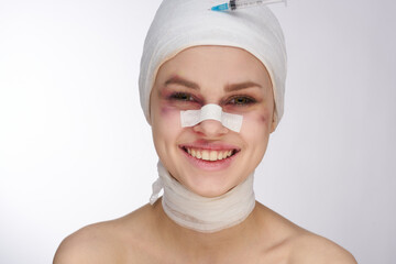 portrait of a woman plastic surgery operation bare shoulders light background